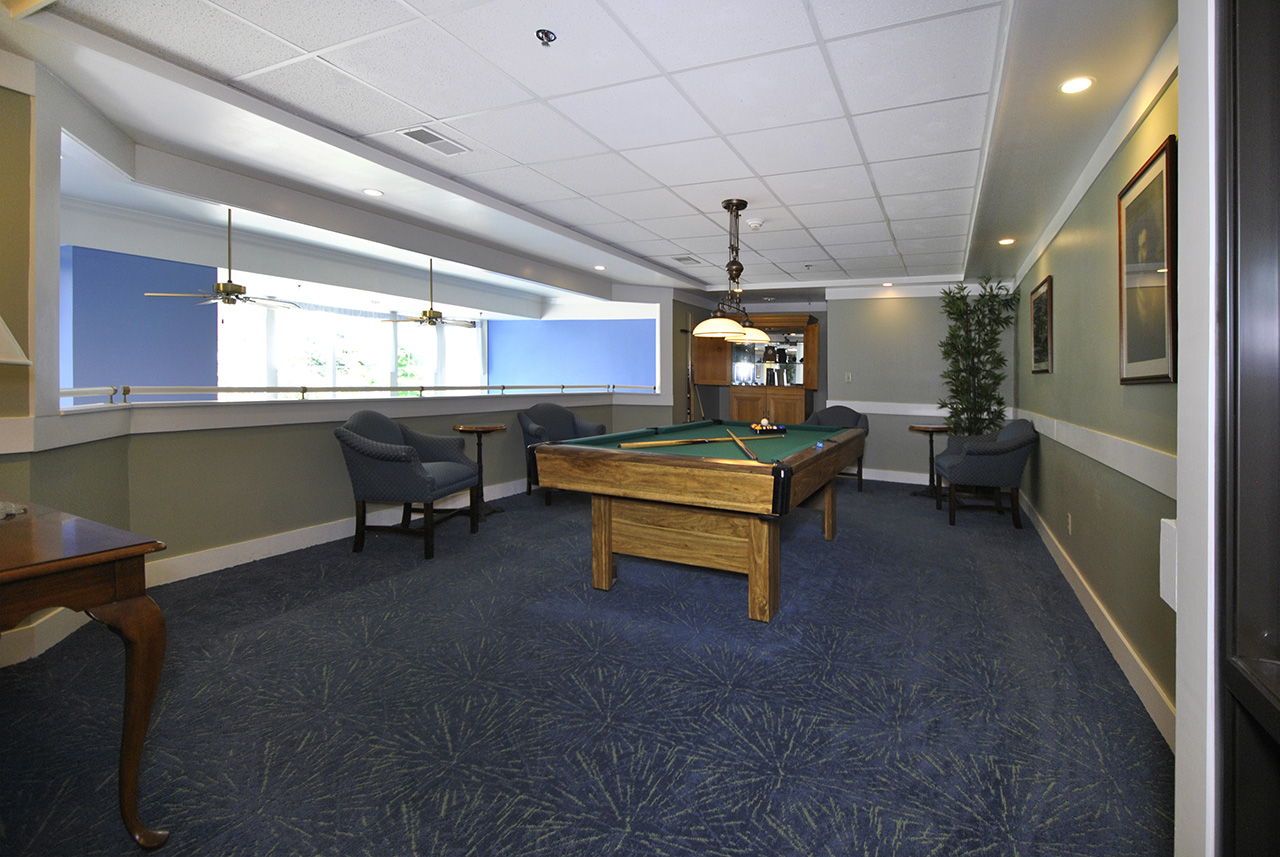 Game room with pool table at Porthaven Manor